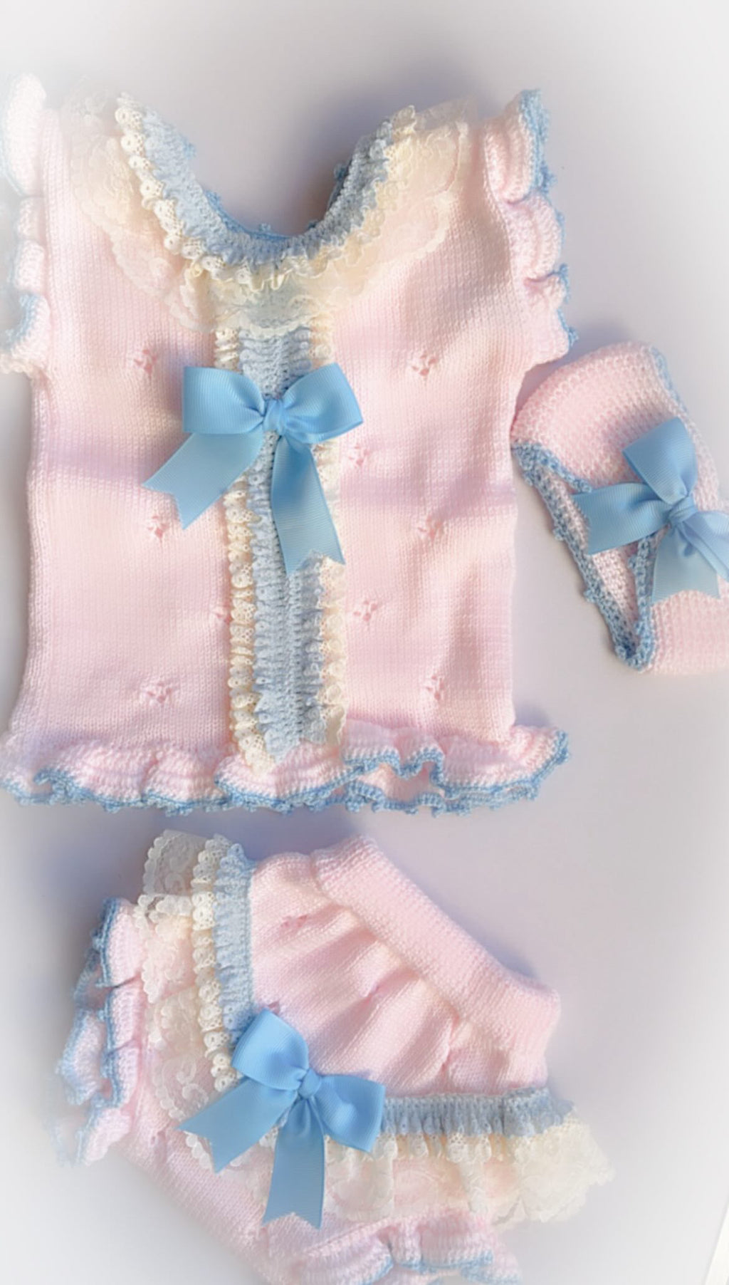 Baby knitted blue and pink set
