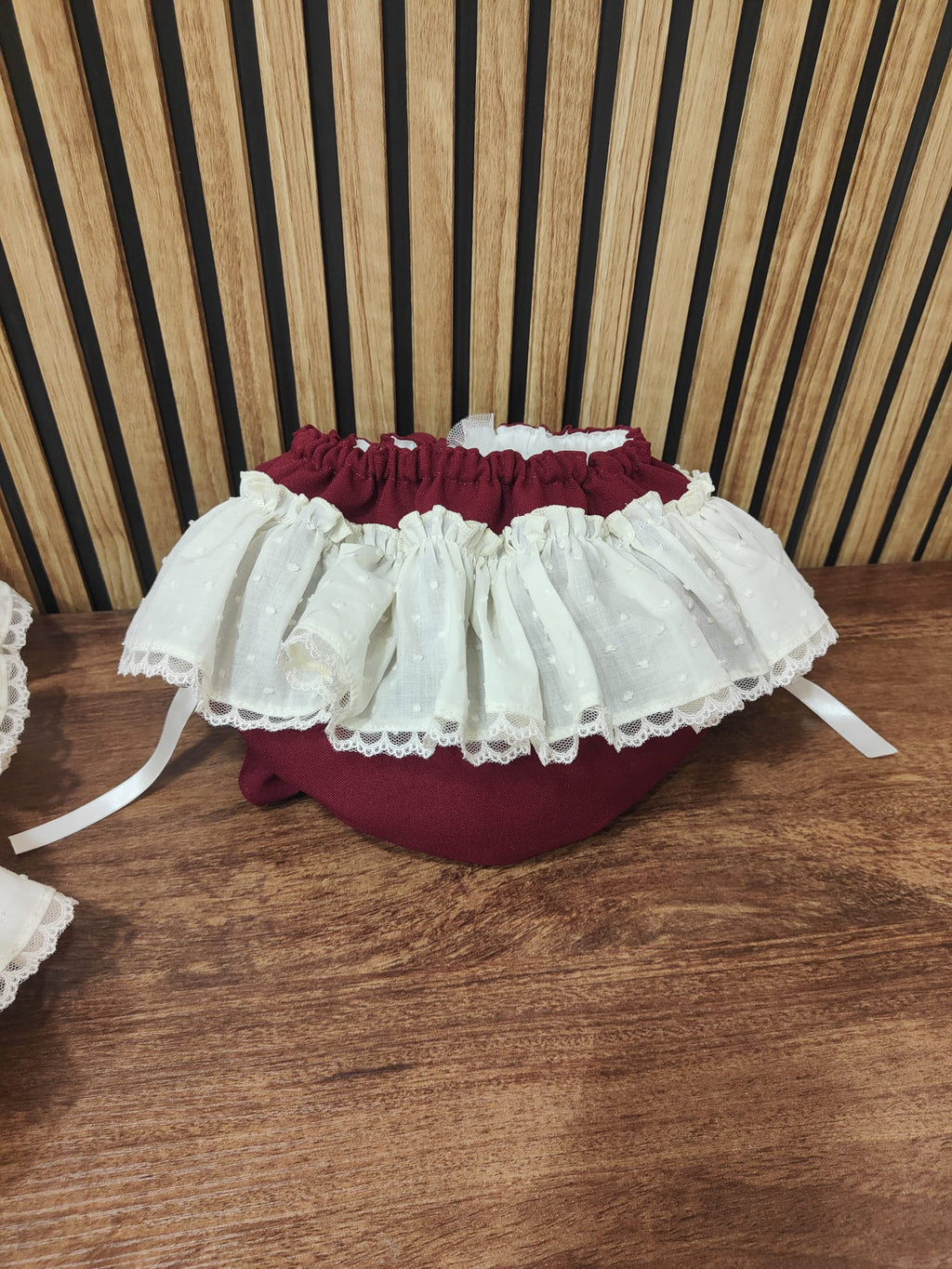 RB burgundy and cream puffball