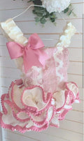 Ela ruffle romper dusty pink