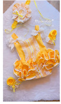 Ela ruffle romper yellow