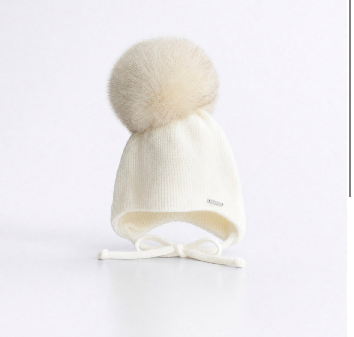 Pangasa faux fur tie hat