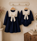 RB navy and cream dress
