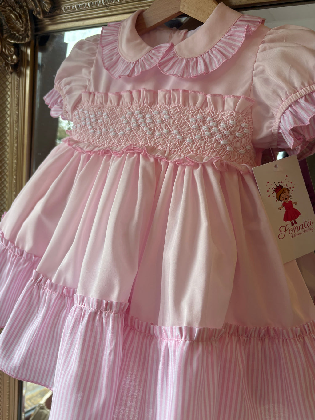 Pink bow candy stripe smocked dress